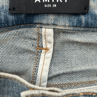 Amiri Clay Indigo T.G.C.W Distressed Logo Jeans