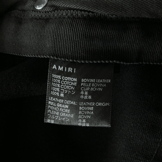 Amiri Faded Black Baroque Varsity Logo Jeans