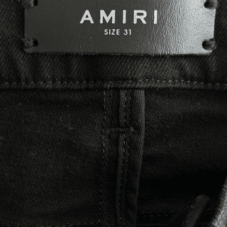 Amiri Washed Black Distressed Knee Jeans
