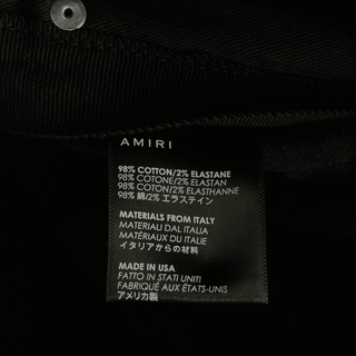 Amiri Washed Black Distressed Knee Jeans
