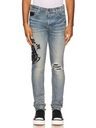 Amiri Wes Lang Reaper Logo Clay Indigo Jeans in Blue
