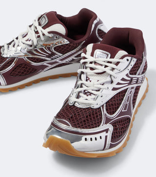 Bottega Veneta Orbit sneakers in Barolo burgundy, front view showing mesh uppers and white laces