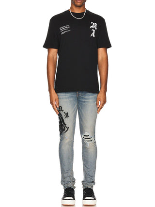 Amiri Wes Lang Reaper Logo Clay Indigo Jeans in Blue