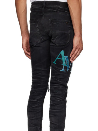 Amiri Leather Staggered Logo Ripped Jeans in Black