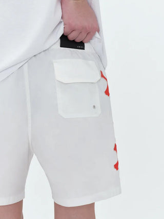 Amiri Bones Printed Swim Shorts in White
