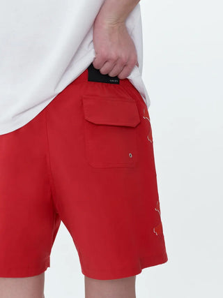 Amiri Bones Printed Swim Shorts in Red